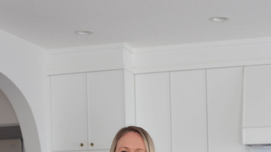 Tara Duncan, founder of Urban Calm Coffee, with coffee for a perimenopause and caffeine guide