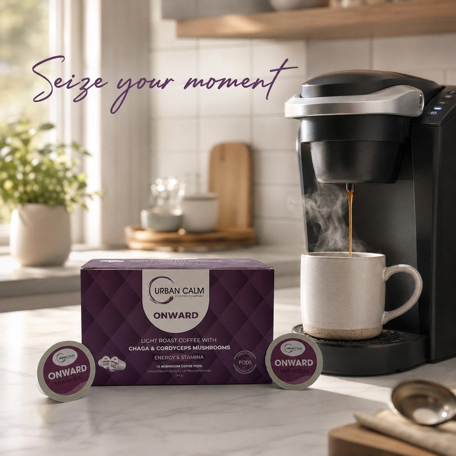 Urban Calm mushroom coffee K-Cup beside a single-serve brewer