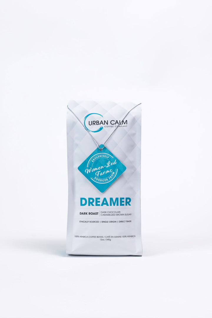 Dreamer dark roast coffee bag with whole bean and ground options, single origin Colombian