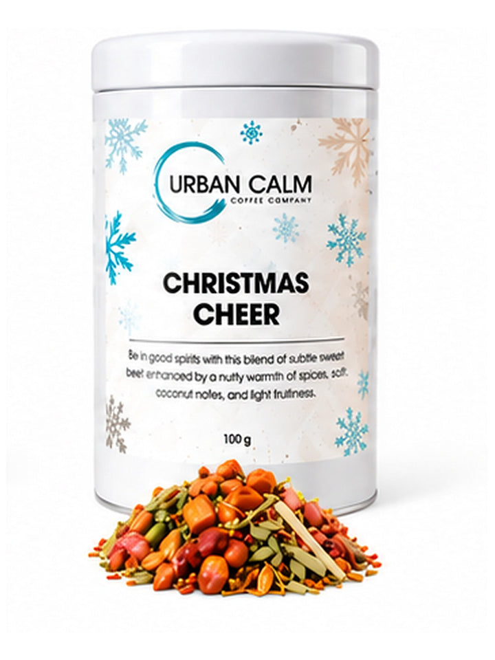 Urban Calm christmas cheer tin with matching ingredients on clean white background, 3:4 portrait