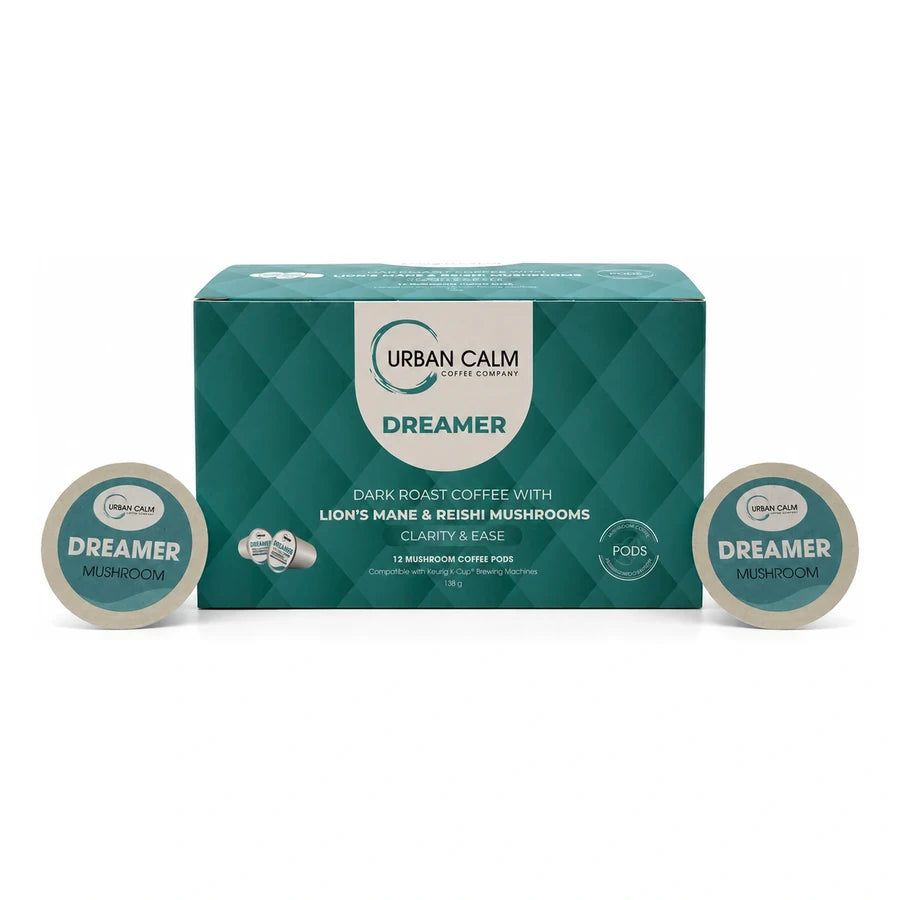 Dreamer dark roast mushroom coffee K-Cup box and pods on white