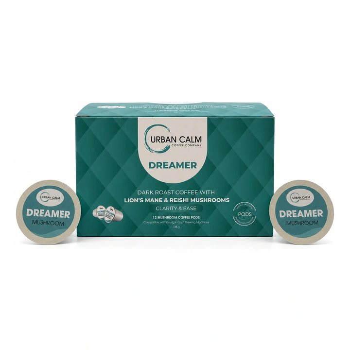 Dreamer dark roast mushroom coffee K-Cup box and pods on white