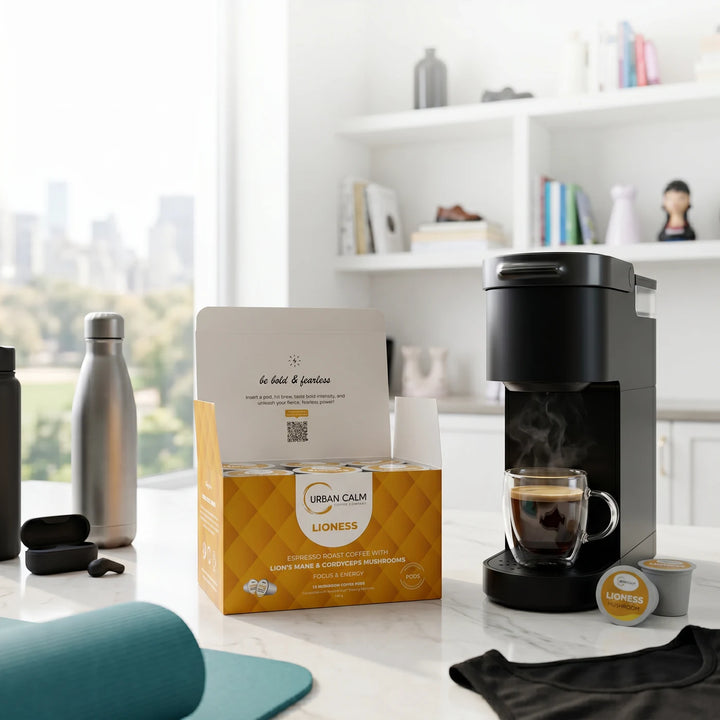 Lioness mushroom coffee K-Cups in an espresso lifestyle setting
